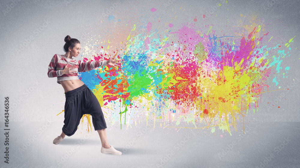 Young colorful street dancer with paint splash Young colorful street dancer with paint splash