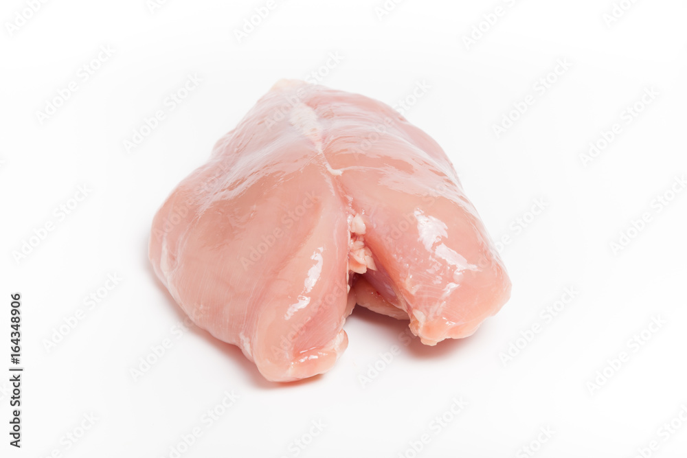 Raw chicken breast on light background