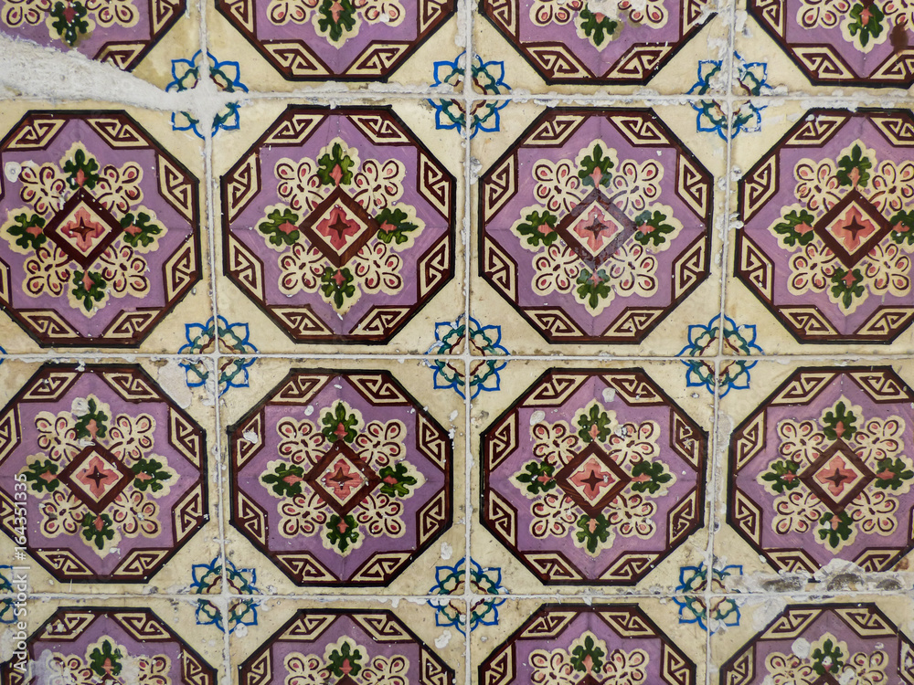 Traditional hand-painted purple Portuguese tiles (azulejos) in Lisbon