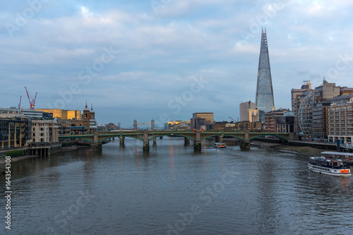 Amazing sunset Cityscape from Millennium Bridge and Thames River, London, Great Britain