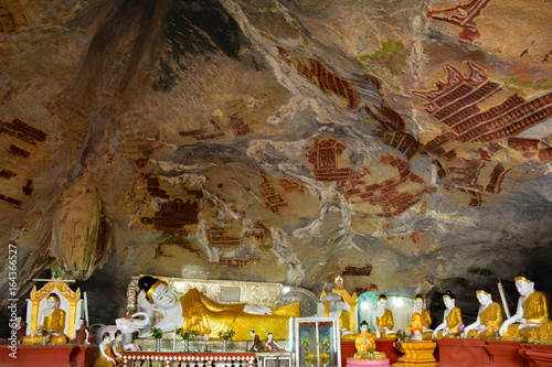 A lot of different Buddha sculptures in Kaw Gun Cave in Hpa-An, Myanmar photo