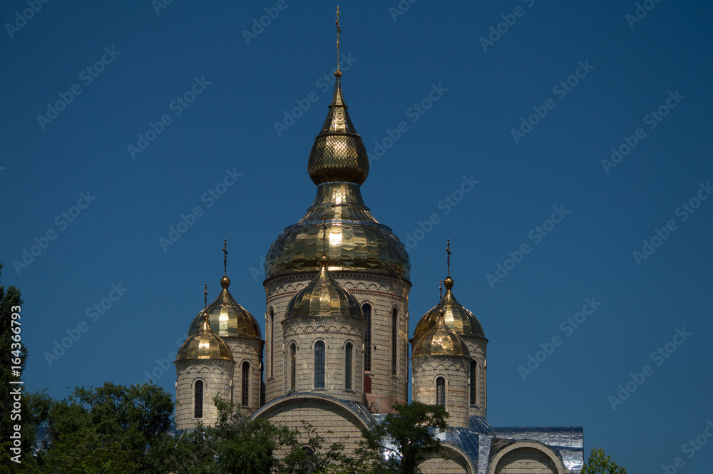 Obraz premium Orthodox temple against the blue sky. A park. Cherkassy, Ukraine. 2017