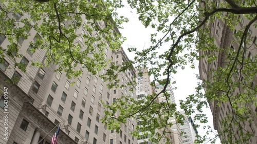 Financial district of Manhattan in New York City. Skyscrapers, view from the bottom point. Steadycam shot