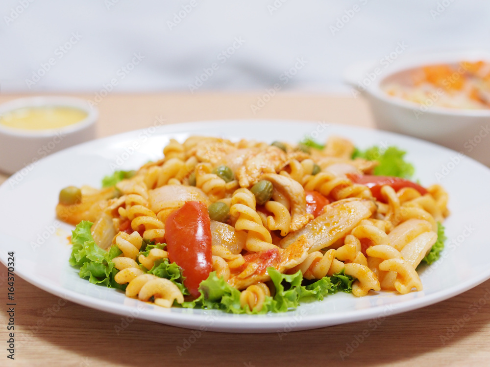 macaroni with tomato sauce on white plate macaroni with tomato sauce on white plate