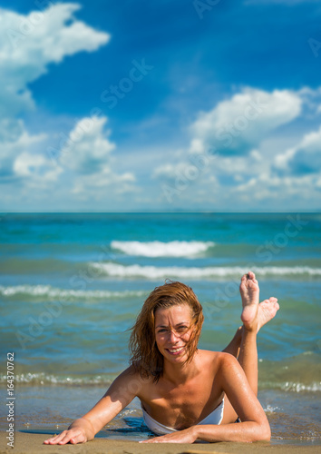 Classy woman on the beach