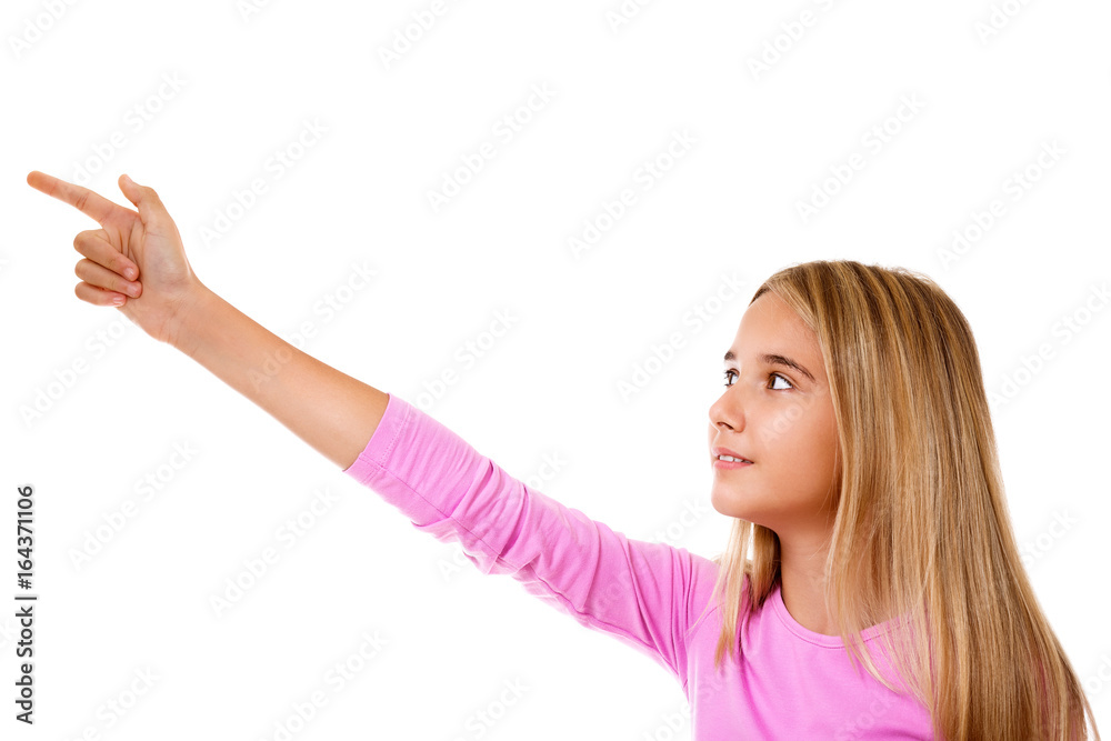 Attractive young girl pointing her finger.Isolated Attractive young girl pointing her finger.Isolated