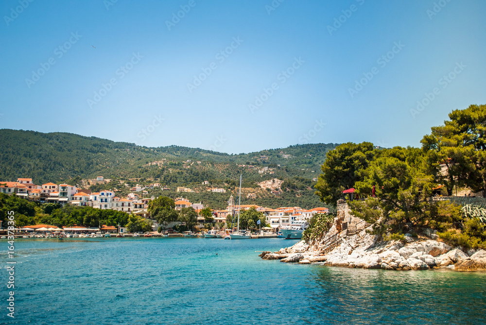 Skiathos, Greece - June 27, 2011: City Skiathos, Greece, with white authentic houses and beautiful nature