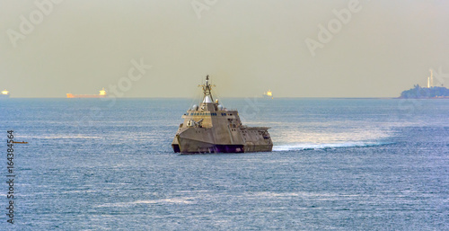 Modern battleship in Singapore Strait.