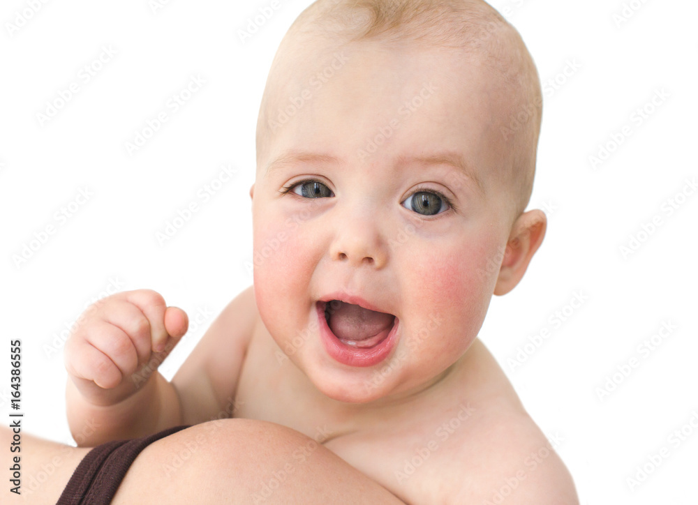 Fun baby is happy to wink and clenching a fist Fun baby is happy to wink and clenching a fist