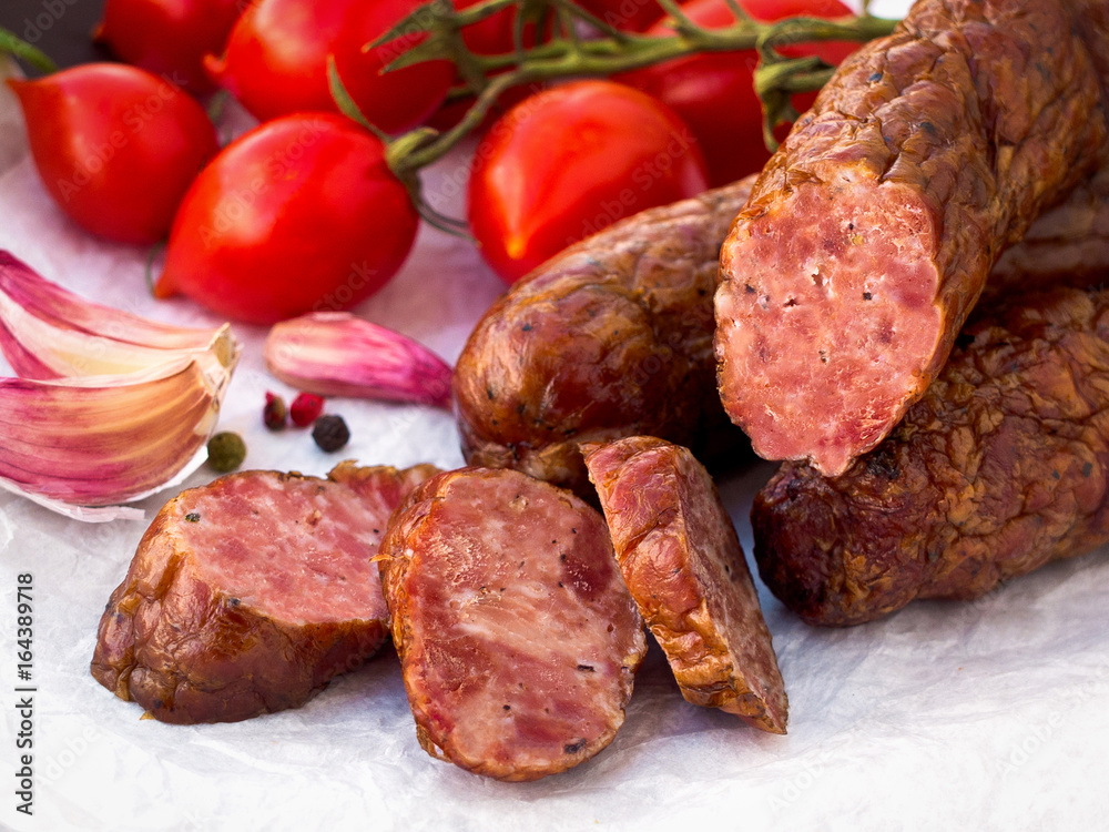 Smoked dried sausage with tomatoes