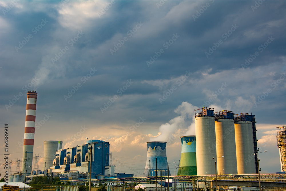Panorama of a thermal power station. Cooling tower, turbine, generator.
