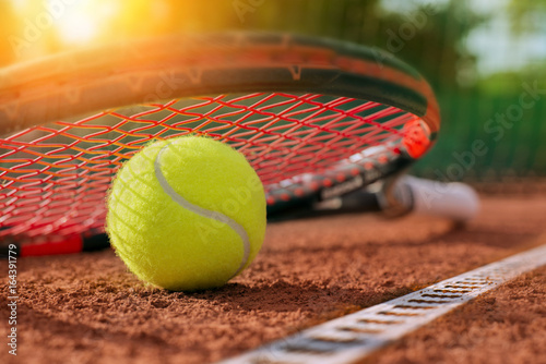 .tennis ball on a tennis court © Mikael Damkier