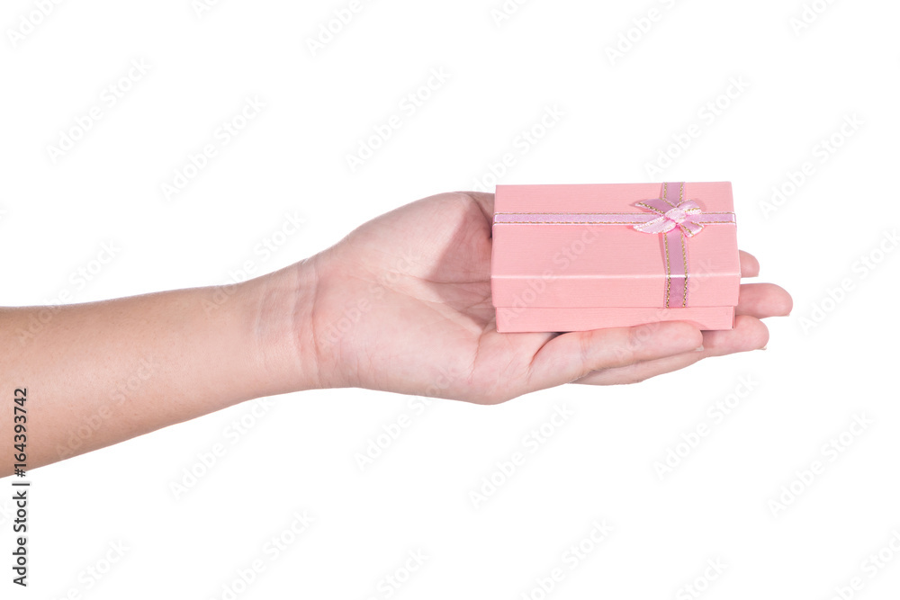 Woman holding gift in hand isolated on white background Woman holding gift in hand isolated on white background