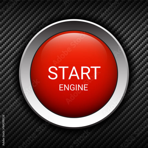 Start engine button on carbon background