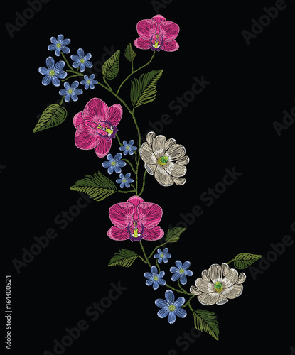 Fototapeta Naklejka Na Ścianę i Meble -  Embroidery stitches with orchid, magnolia and hepatica flower.. Decoupage. Vector fashion ornament on black background for traditional floral decoration. Pattern for textile and fabrics.