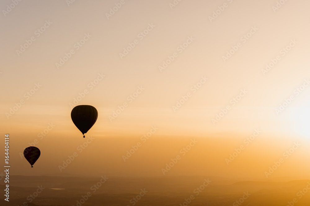 Naklejka premium Hot air balloons flying over Cappadocia, Turkey