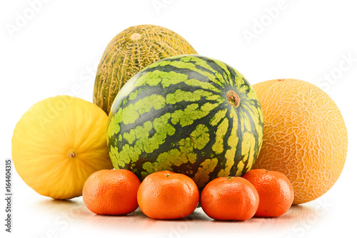 Composition with assorted melons and tangerines