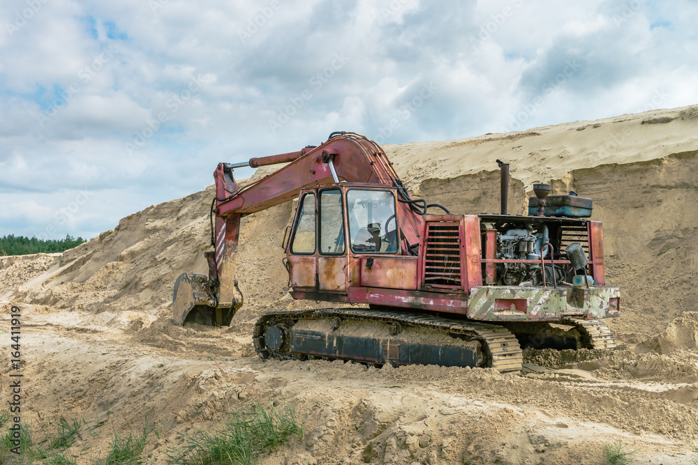 Fototapeta premium Sand quarry sand pit digger summer light 