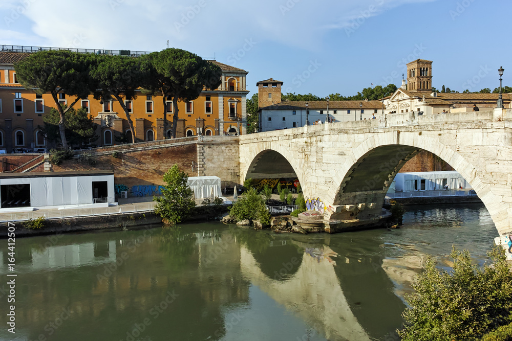 Amazing view of Tiber River and Pons Cestius in city of Rome, Italy