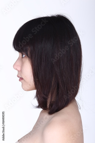 Asian Woman before make up hair style. no retouch, fresh face with acne,
