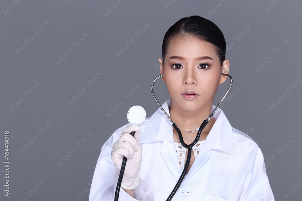 Beautiful Asian Tan Skin Woman Doctor White Shirt suit with stethoscope on neck Beautiful Asian Tan Skin Woman Doctor White Shirt suit with stethoscope on neck