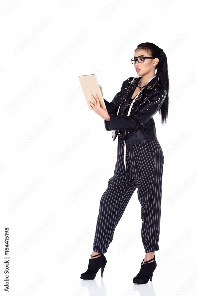Asian Female Fashion Designer draw and paint on tablet Asian Female Fashion Designer draw and paint on tablet