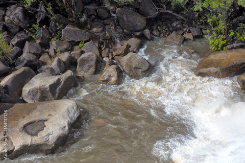 Rocks at the bottom of Davies Creek Falls photo