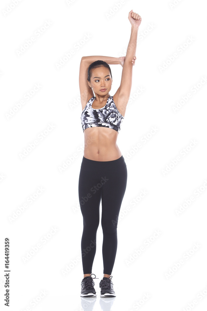 Tan Skin Asian Fitness Girl in Sport Bra black spandex pants Exercise warm  up Stock Photo | Adobe Stock
