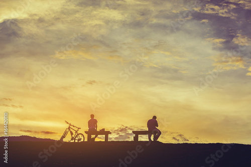silhouette of people in sunset time