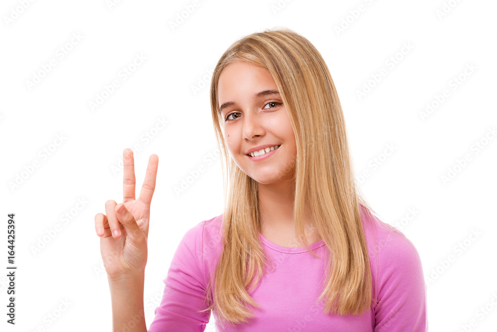 Picture of lovely young girl showing victory or peace sign.Isolated Picture of lovely young girl showing victory or peace sign.Isolated