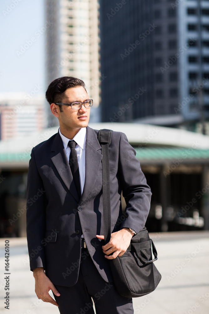 Young asian businessman outdoors Young asian businessman outdoors