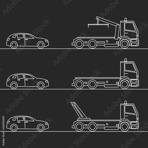 Tow truck picking up a vehicle, on black background