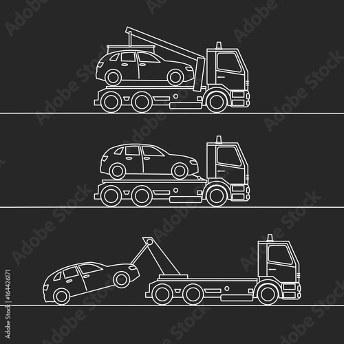 Tow truck picking up a vehicle, on black background