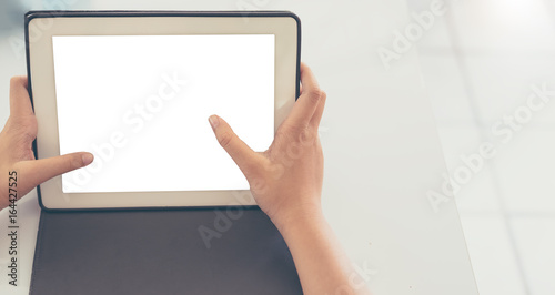 woman hand is holding touch screen tablet