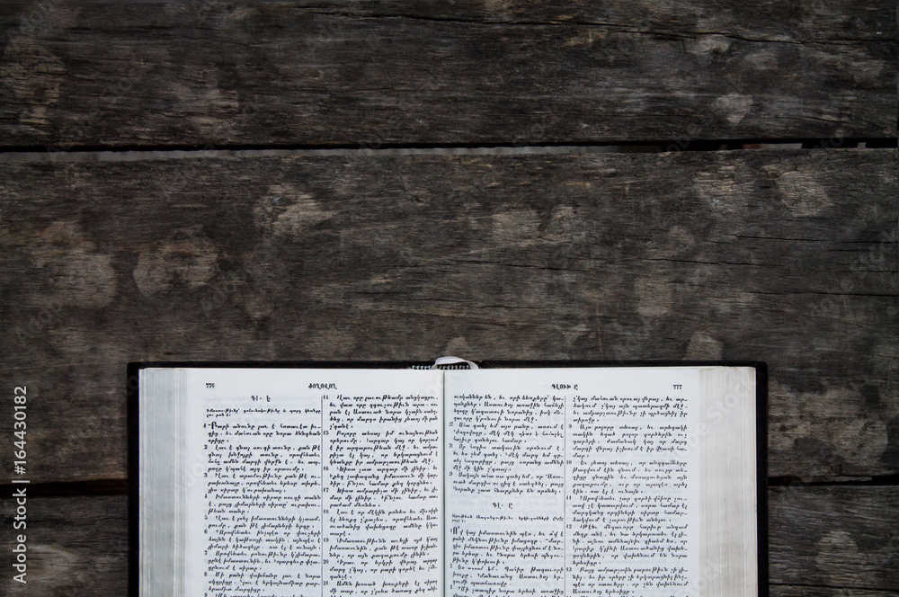 Fototapeta premium Bible on a wooden desk.