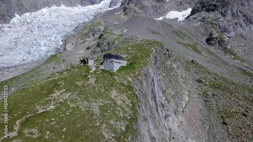 Hut in high mountain. Monzino Hut, Mont Blanc italian face. Courmayer, Valle d'Aosta, Italy. photo