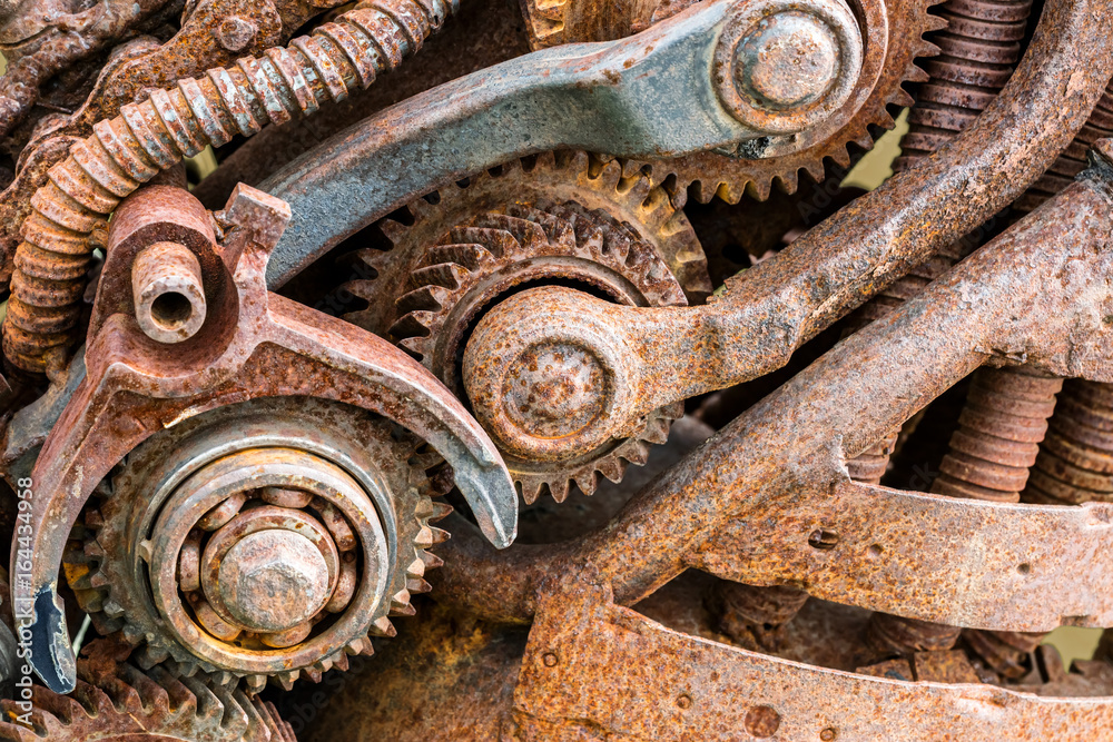 old rusty industrial machinery with gear wheels old rusty industrial machinery with gear wheels
