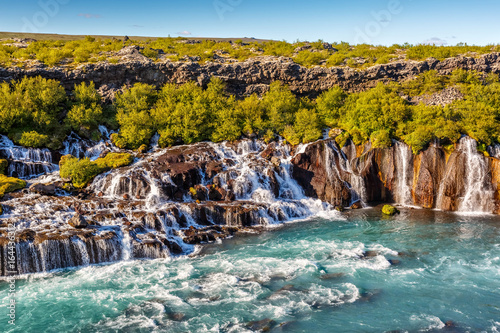 Hraunfossar waterfall in Iceland at sundown