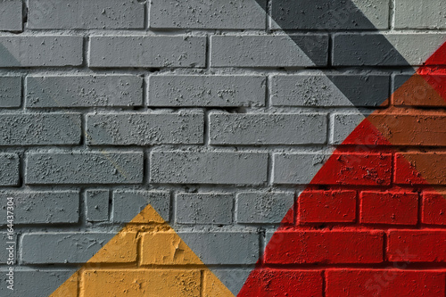 Colorful very small fragment of street graffiti, brick wall. Abstract creativ...