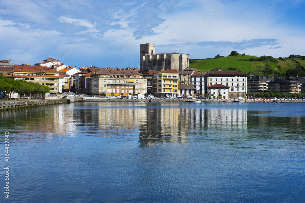 Village of Zumaia reflected in water, Euskadi