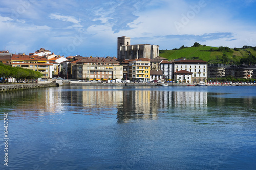 Village of Zumaia reflected in water, Euskadi