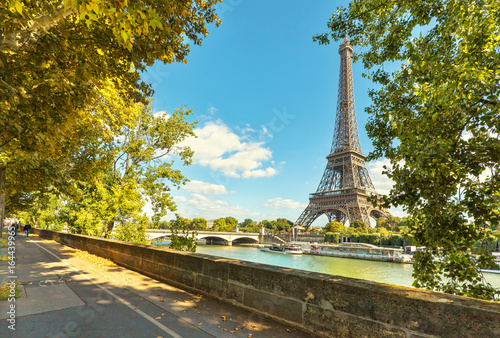 The Eiffel tower in Paris. Jena Bridge is a bridge spanning the River Seine in Paris.