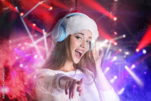 Young woman with headphones...