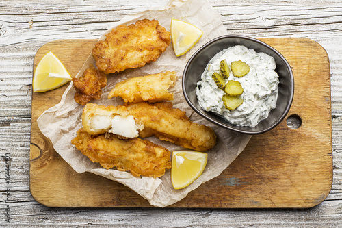Картината върху платно Fish dish - Cod in beer batter with tar tar sauce for a healthy and comfortable