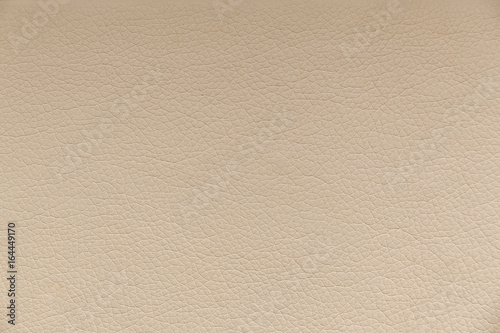 Texture of beige leather, background.