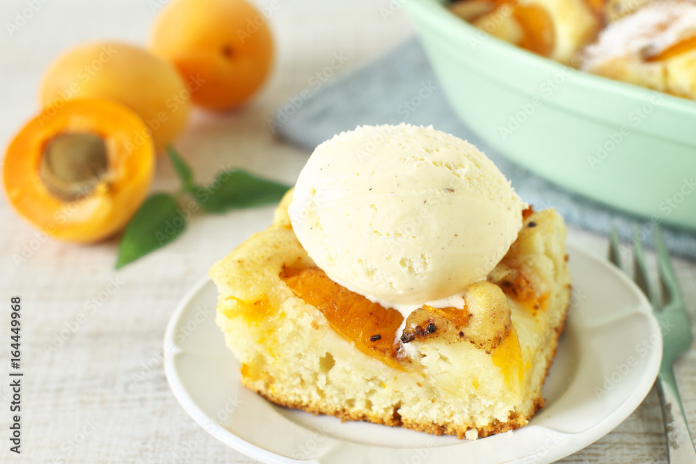 Homemade rustic apricot cake with ice cream Homemade rustic apricot cake with ice cream
