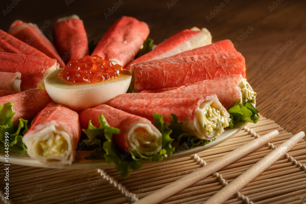 Delicious salad with crab sticks prepared for eating