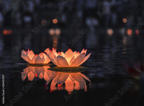 Floating lantern at night photo