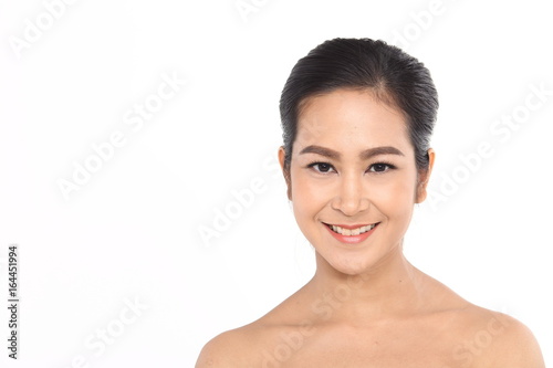 Beautiful Asia Thai woman with black hair, open shoulder and smile, face close up portrait studio on white, copy space for text