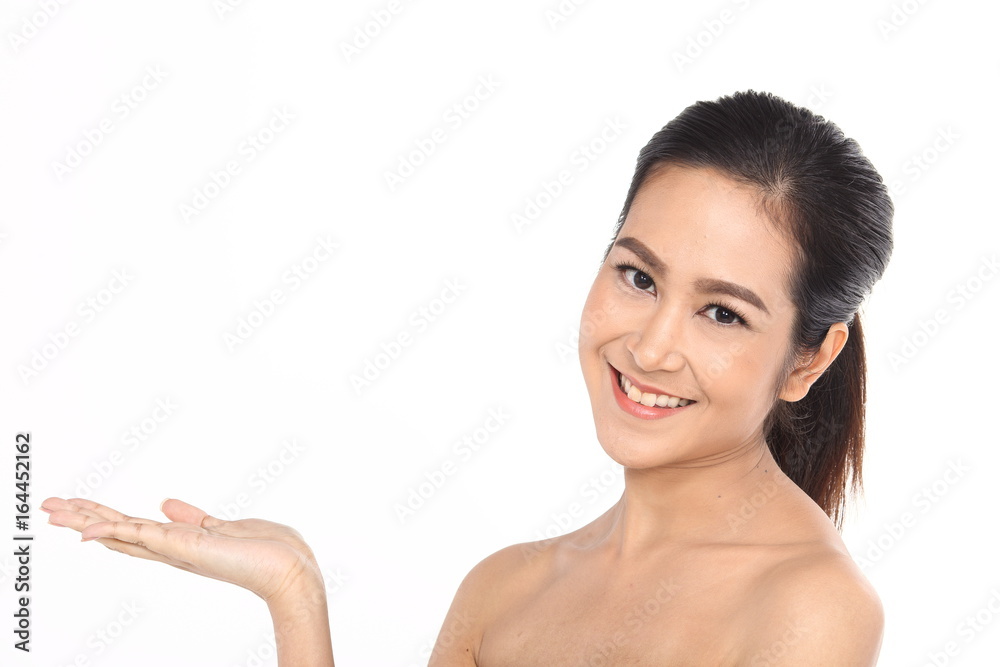 Beautiful Asia Thai woman with black hair, open shoulder and smile, face close up portrait studio on white, showing empty palm with copy space Beautiful Asia Thai woman with black hair, open shoulder and smile, face close up portrait studio on white, showing empty palm with copy space